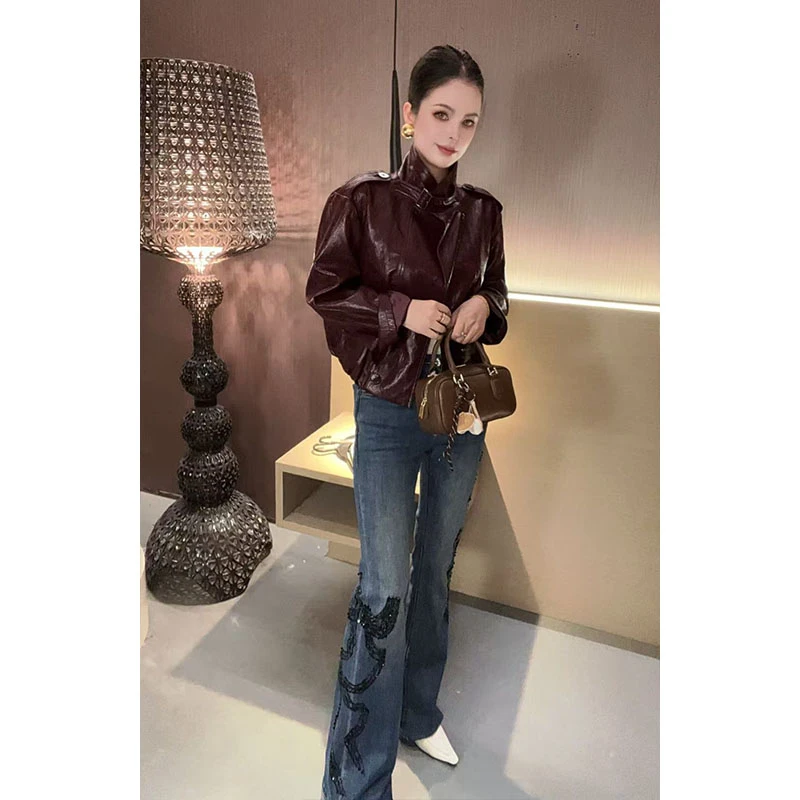 重工蝴蝶结烫钻喇叭牛仔裤K30942