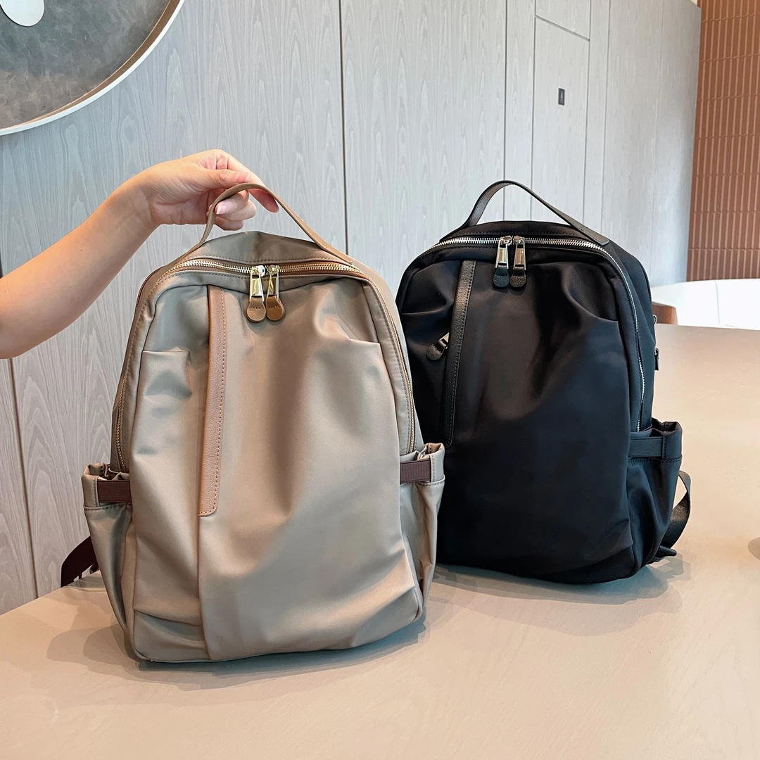 高级轻便旅游双肩包女2025新款时尚高颜值牛津布电脑通勤女士背包