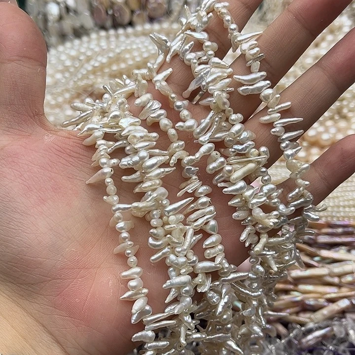 玛瑙/玉髓未镶嵌珠宝半成品一条侧孔长牙巴洛克珍珠