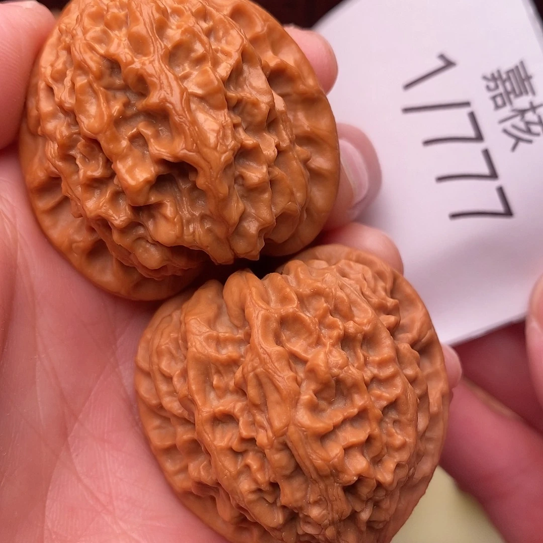 文玩核桃把件40金牛