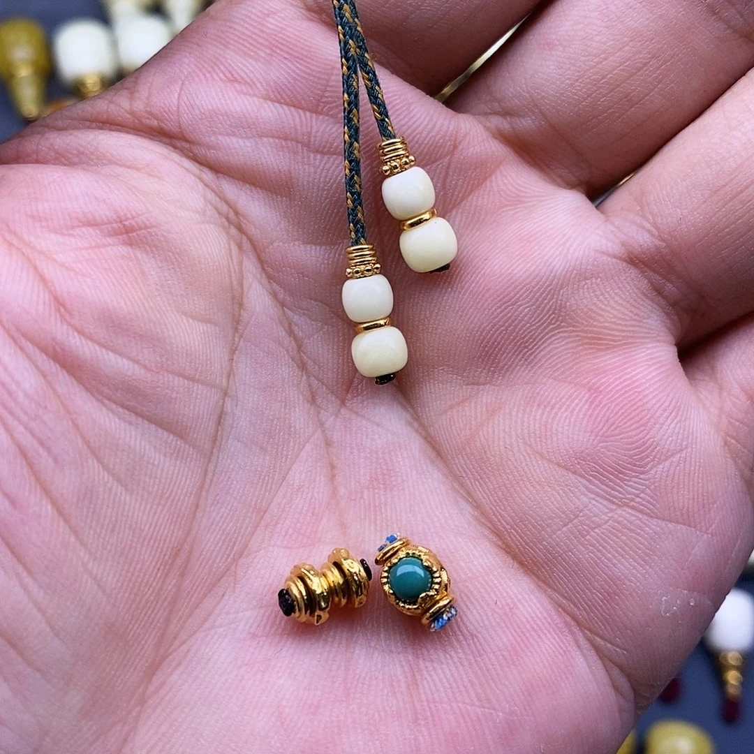 垚***丶琥珀18K金镶嵌裸石6mm18K金轴 背云 银镀金蜜蜡弟子珠