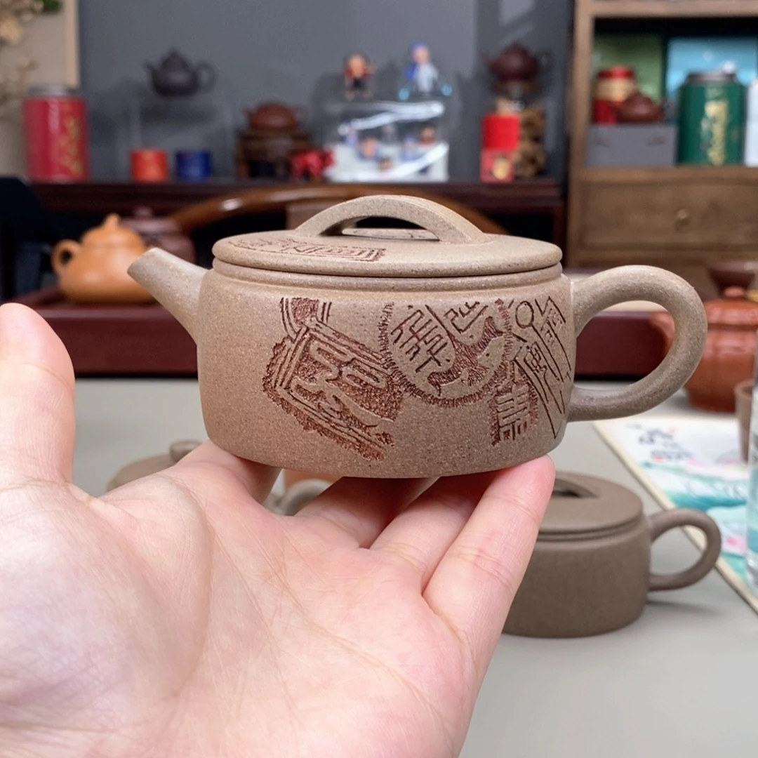 茶壶紫砂黄降坡汉瓦刻图腾半手170cc