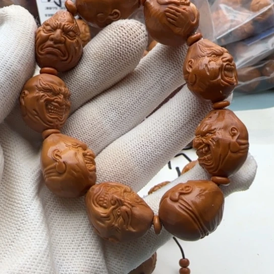 橄榄核手串雕刻工艺