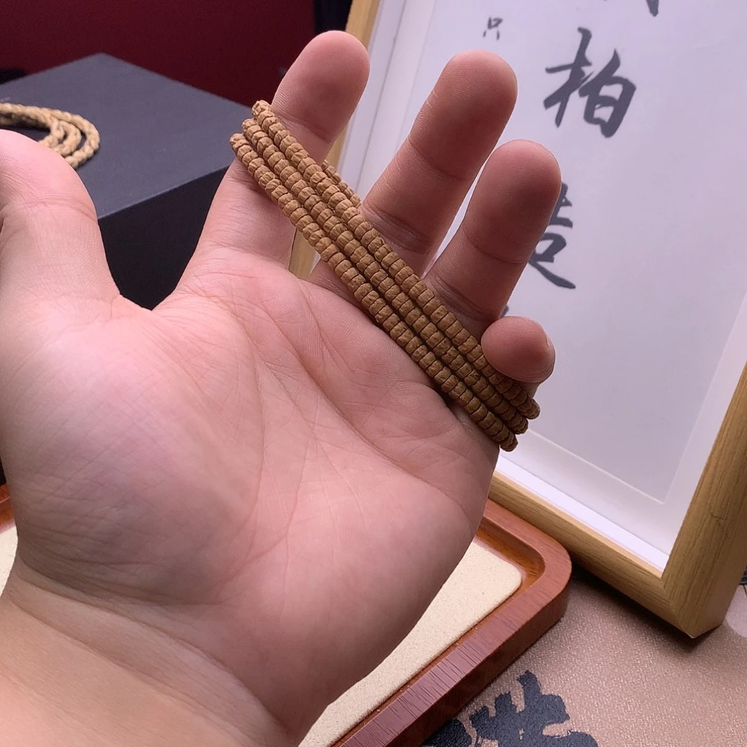 柏香籽/百香籽吊坠金*莲红皮药片