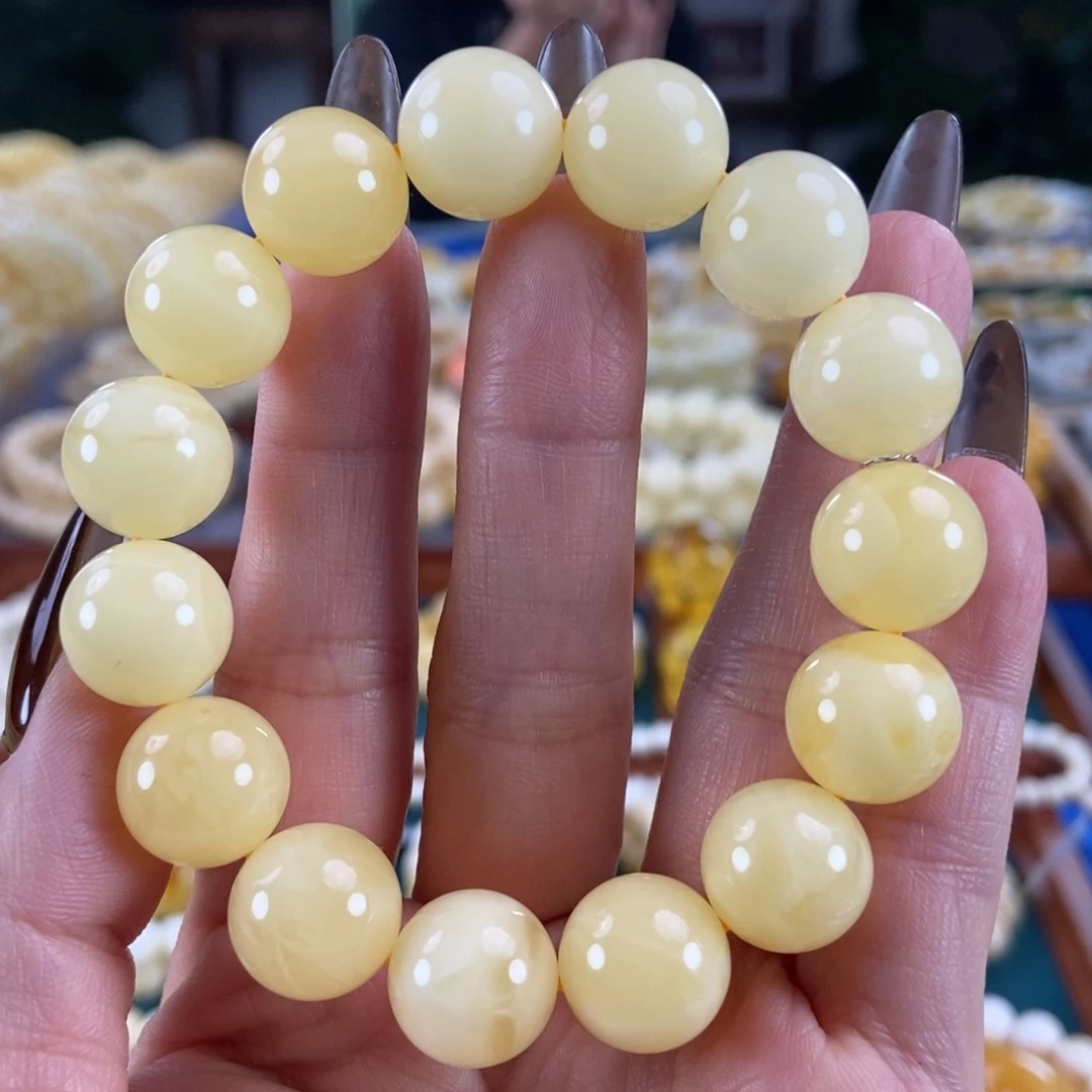 宇***琥珀未镶嵌珠宝奇石13圆珠19.86