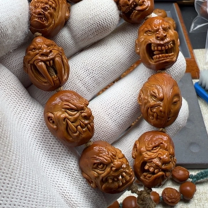 橄榄核手串九****^橄榄核雕工艺制作