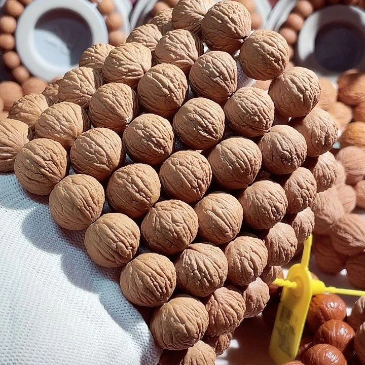 猴头核桃手串十****)野生麒麟凤羽