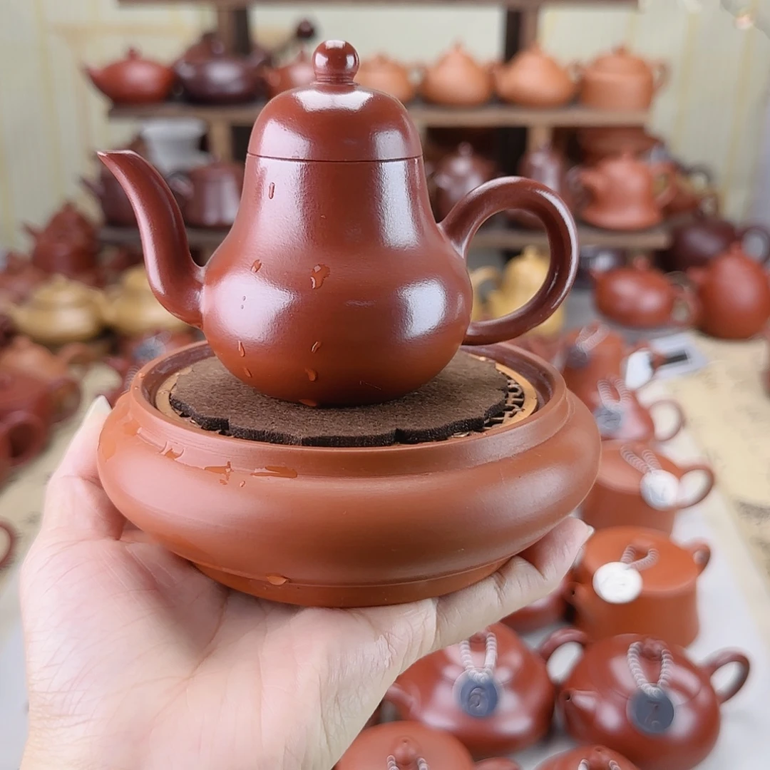 在***敏紫砂茶壶大红袍思婷和镂空壶承