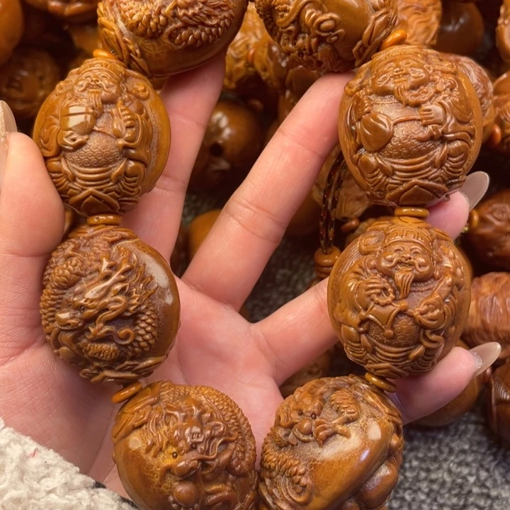 橄榄核手串开****。橄榄核