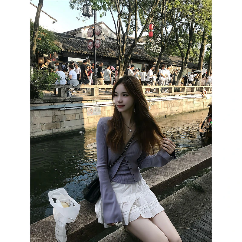 2025年秋季新款紫色设计感针织开衫外套女秋季长袖挂脖背心半身裙