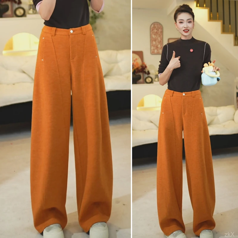 美利奴羊毛裤女秋冬季弯刀新款橙色羊毛呢阔腿时尚香蕉裤百搭流行