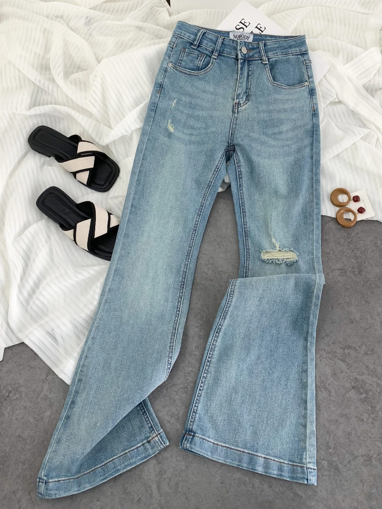 早秋新款微喇裤破洞裤女2025韩版百搭高腰显高显瘦气质弹力牛仔裤