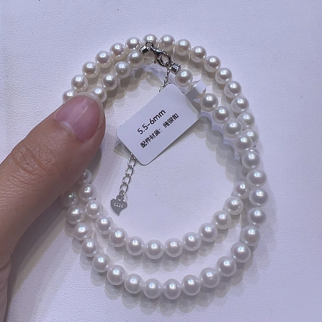 都***人银S925镶嵌淡水珍珠耳饰