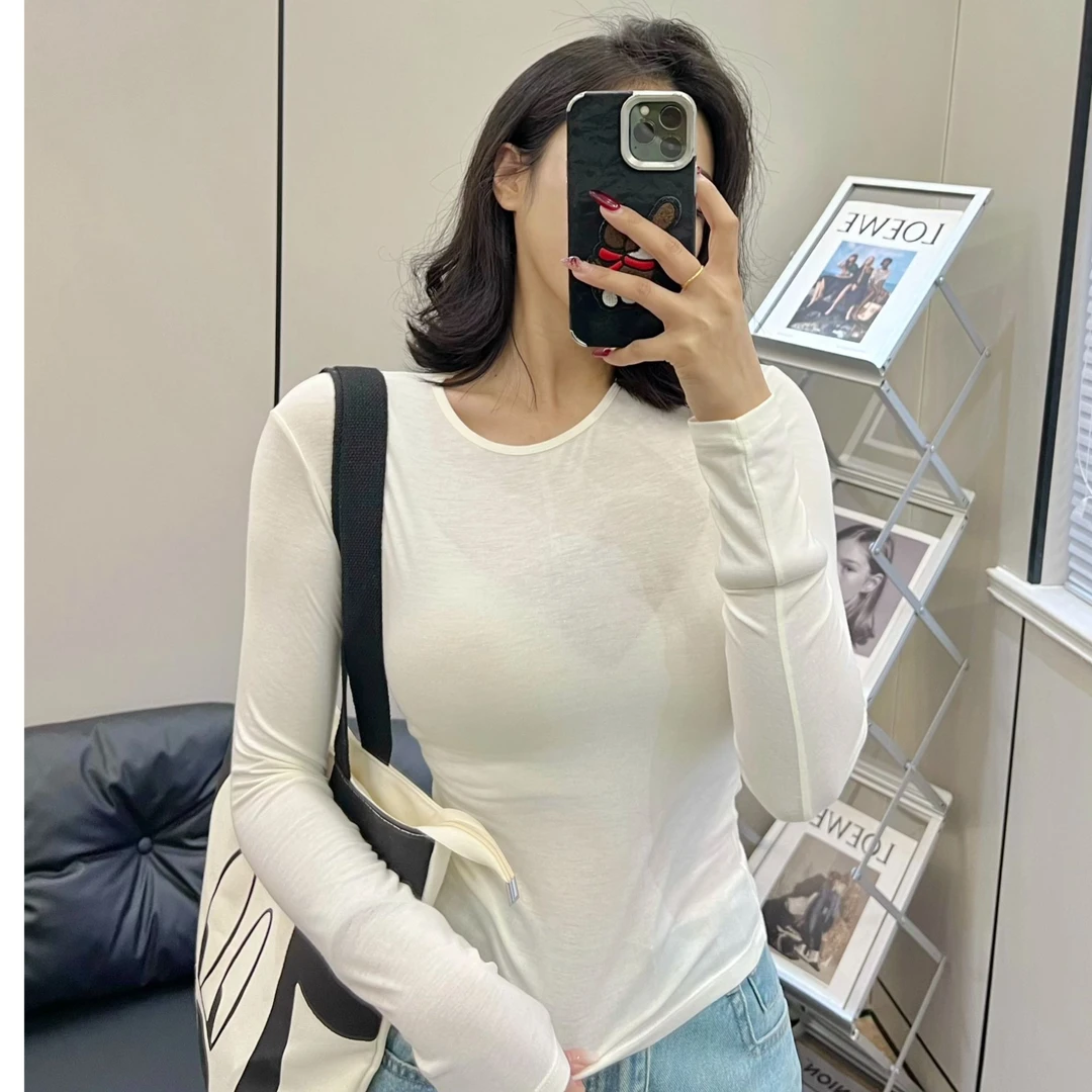 纯色圆领白色微透长袖时尚千金风针织运动T恤修身型春夏休闲风