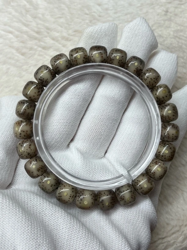 石玉料灰糯冰全玉化单凤眼留白10x9桶珠，原生态星月菩提，一物一图