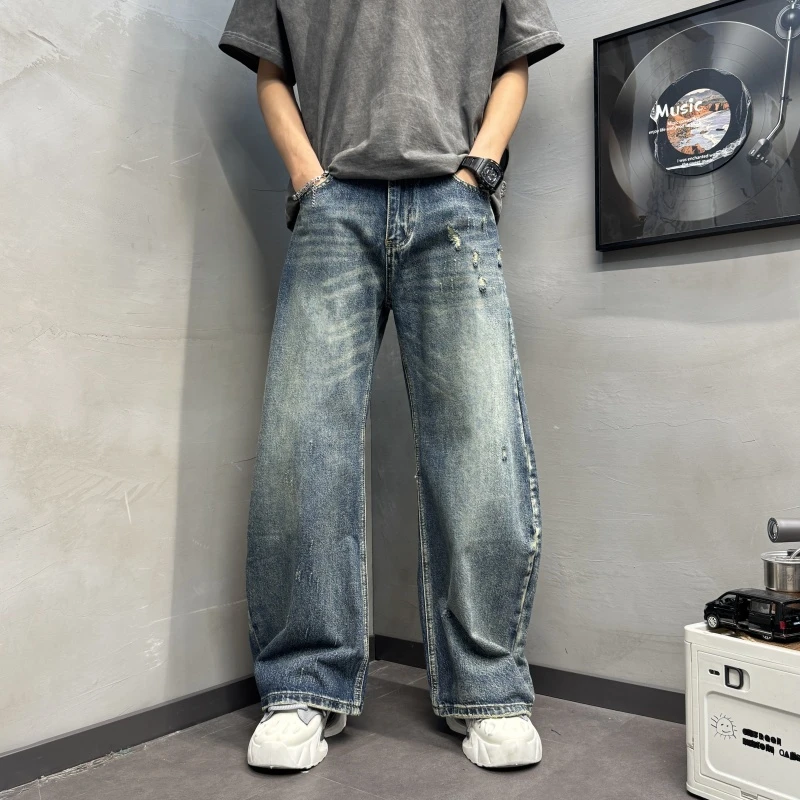 2025新款弯刀抓痕破洞美式宽松蓝色牛仔裤美式蓝色破洞弹力牛仔裤