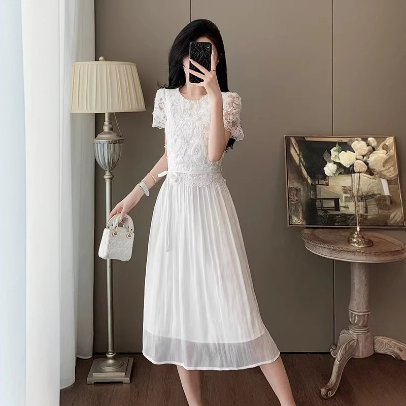 高端精致蕾丝连衣裙女2025夏季法式气质小众设计拼接网纱白色裙子