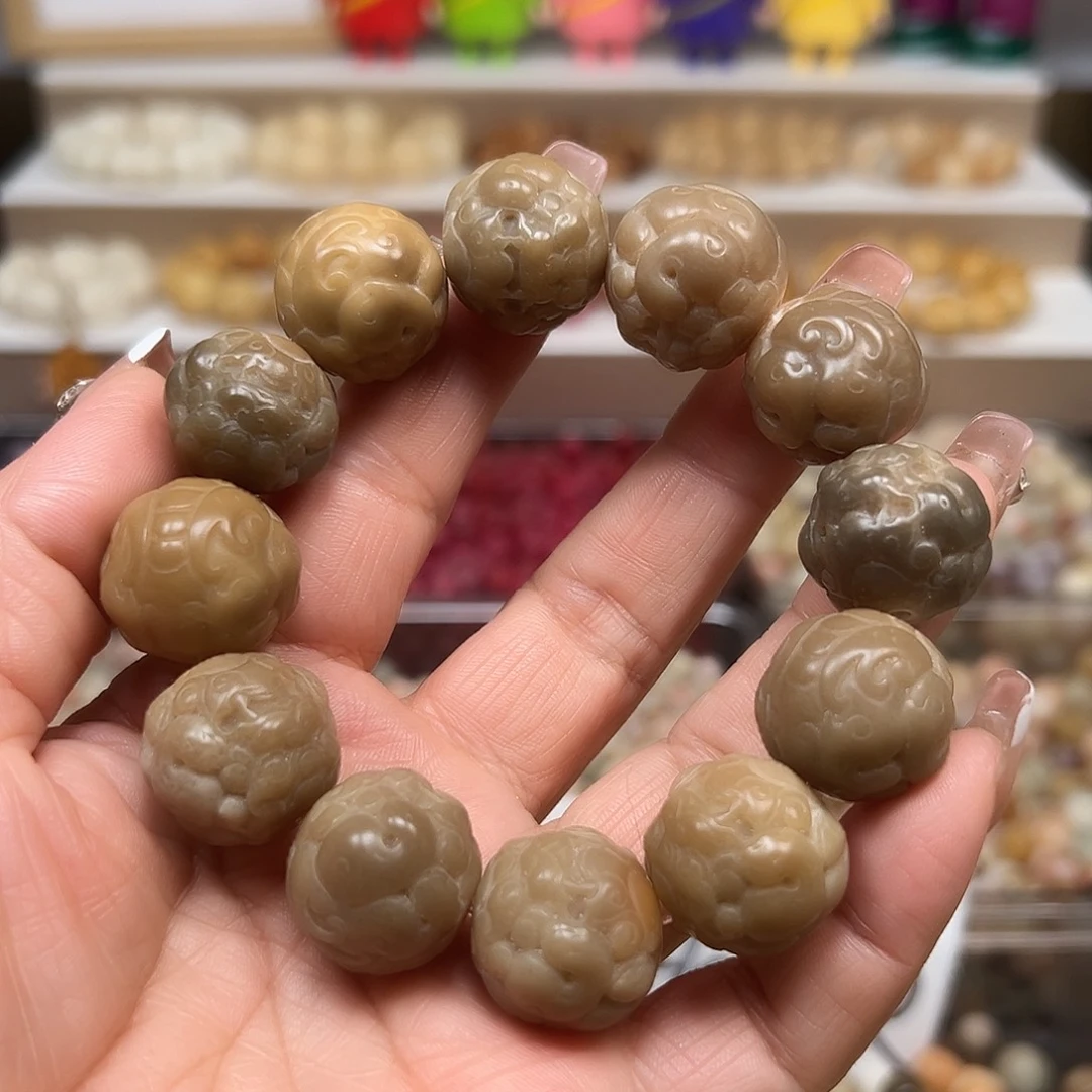 手串菩提根/象牙果瑕疵貔貅1条