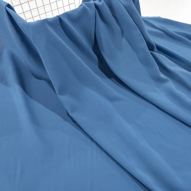 牛仔蓝色 纯色雕印棉绸布料 素色人造棉绵绸 凉爽服装连衣裙面料