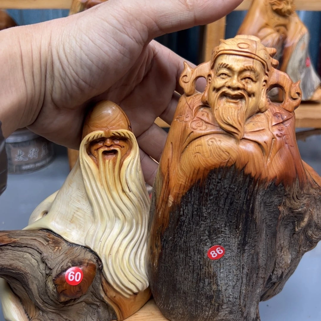 沂***人木崖柏木摆件手把件