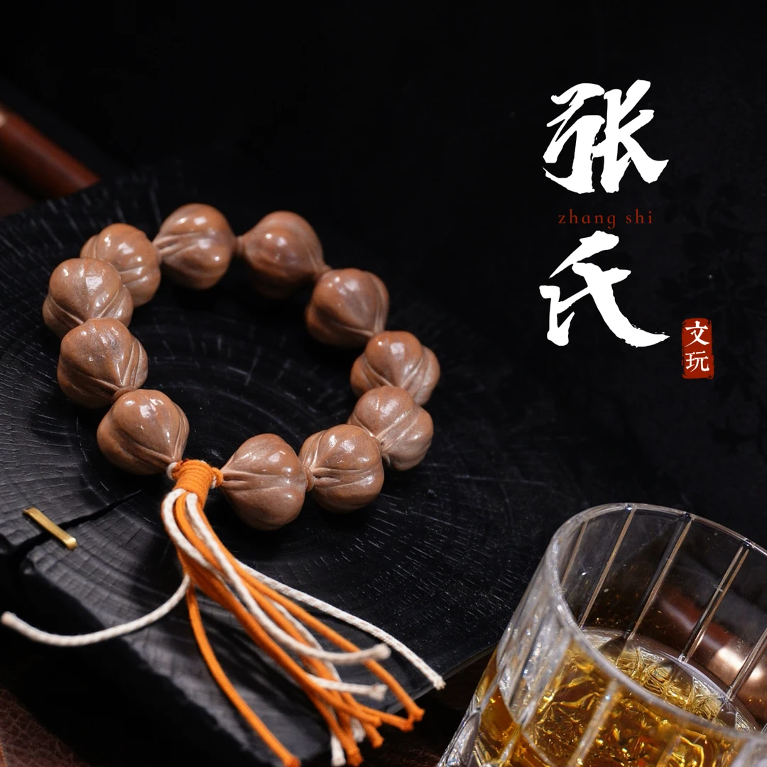 【张氏文玩】《小鸟三面佛》 精品橄榄核素核手串  精挑矮桩