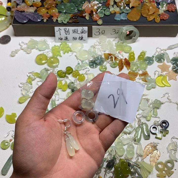曾***觉合金蛇纹石玉耳钉