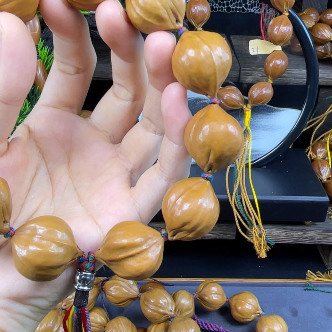 沉***默吊坠橄榄核006.2.4、八颗铁核