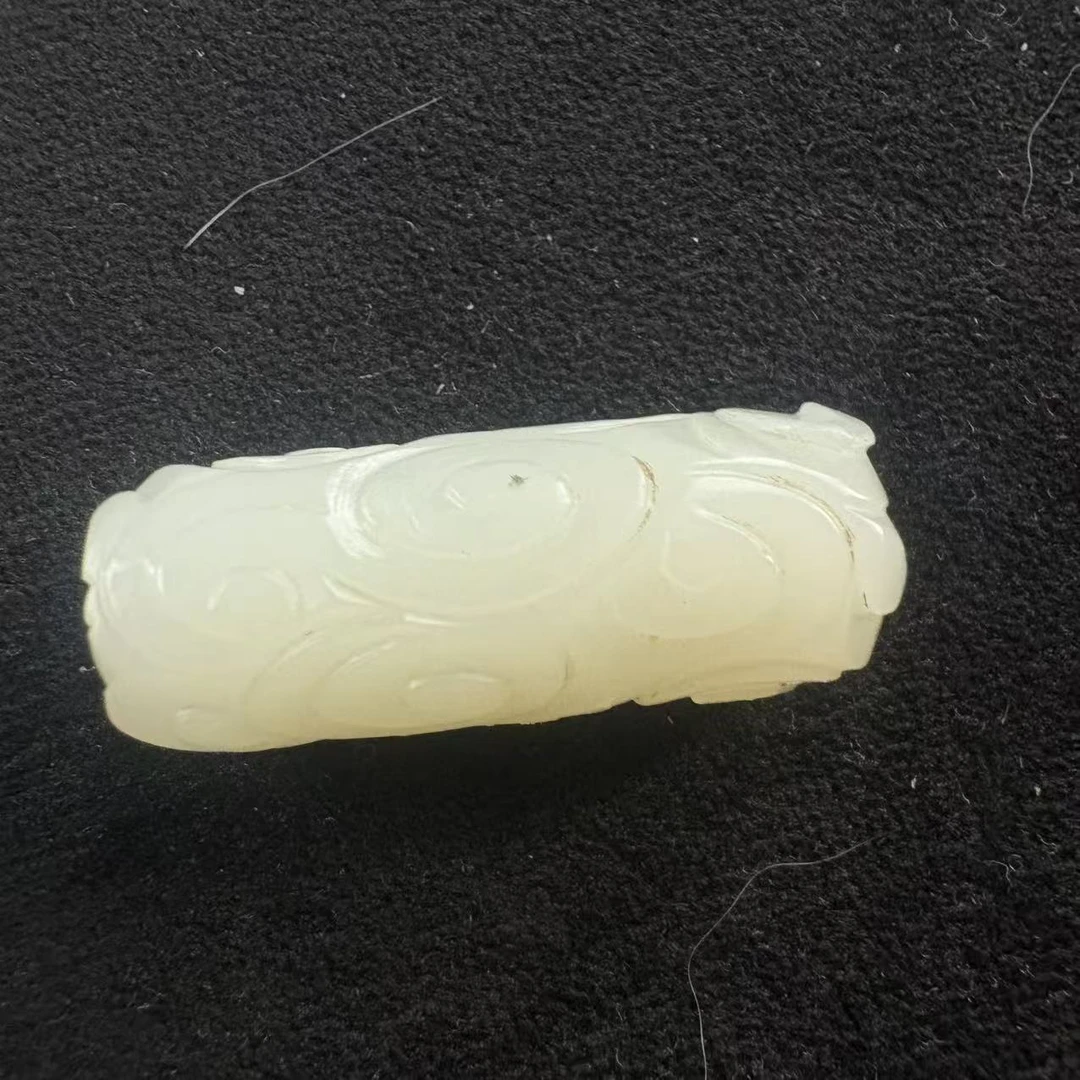 19JJ155   清   和田玉卷云纹勒子