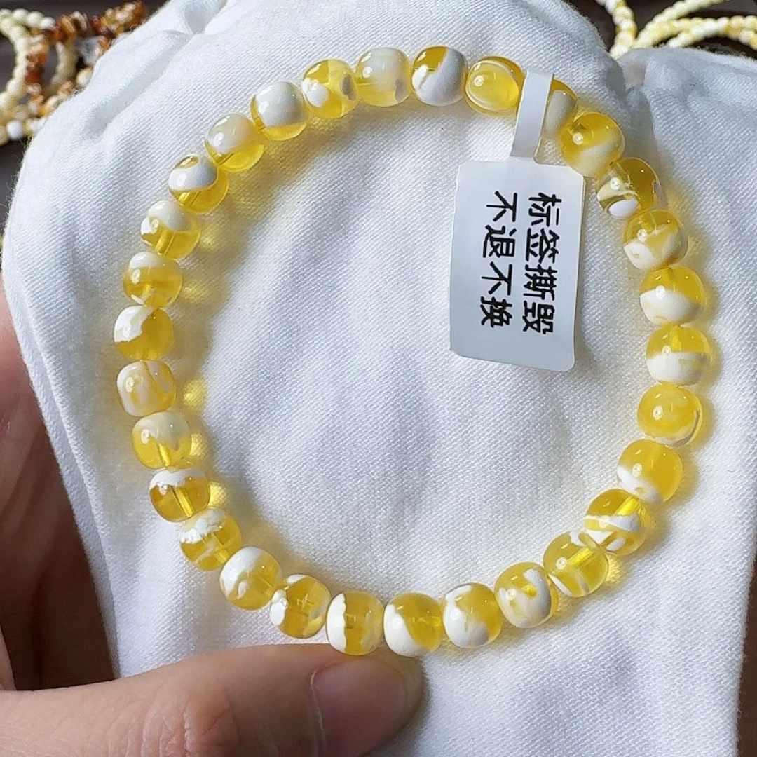 裸石琥珀未镶嵌7mm金漆白