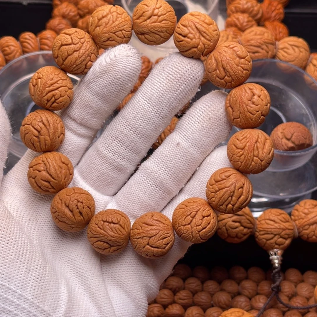 手串桃核金丝龙珠1.7