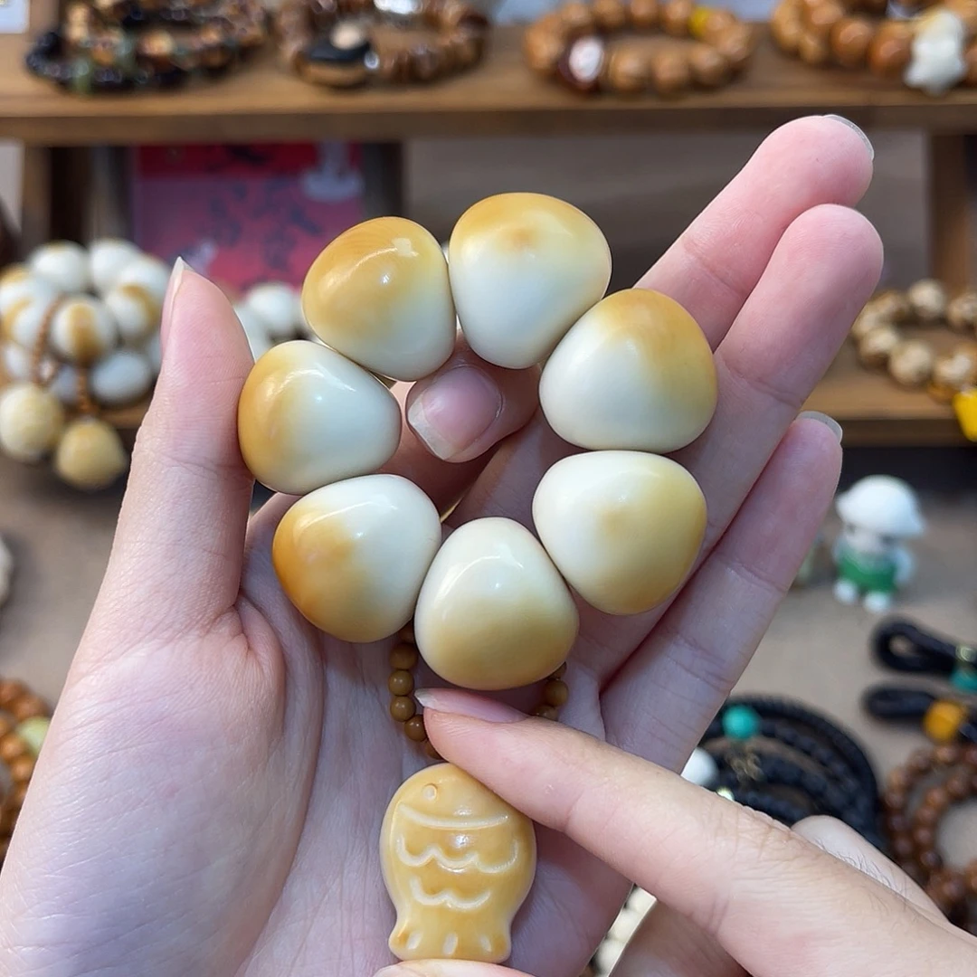 茜***茜吊坠菩提根/象牙果烤面包搭配小鱼