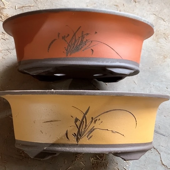 紫砂   70-2。 38.5-28-13。