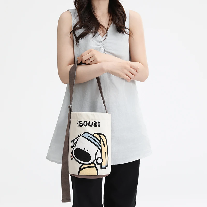 尼睿x吃盐的鱼 新款飘带水桶包休闲手提包单肩包休闲原创帆布包女