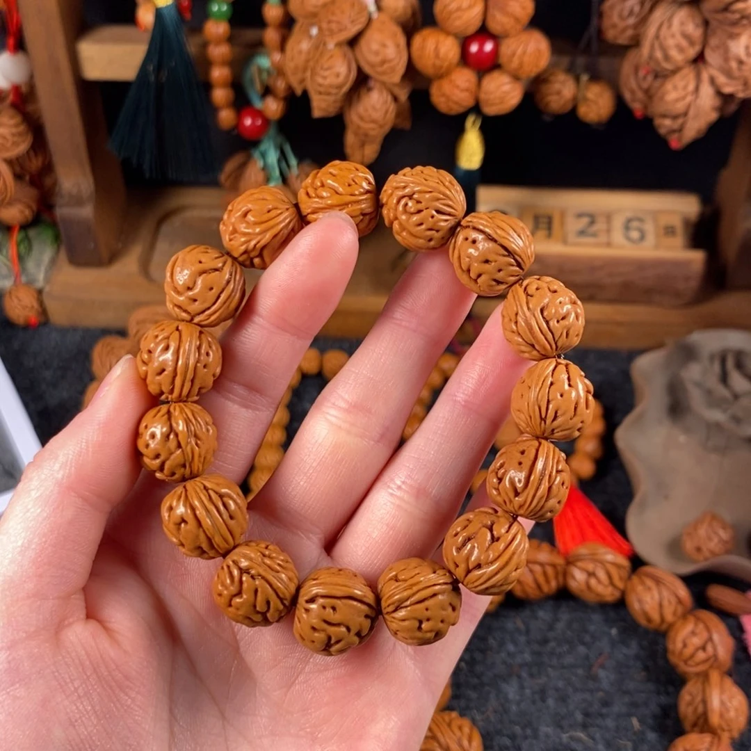 吊坠桃核桃枭手串