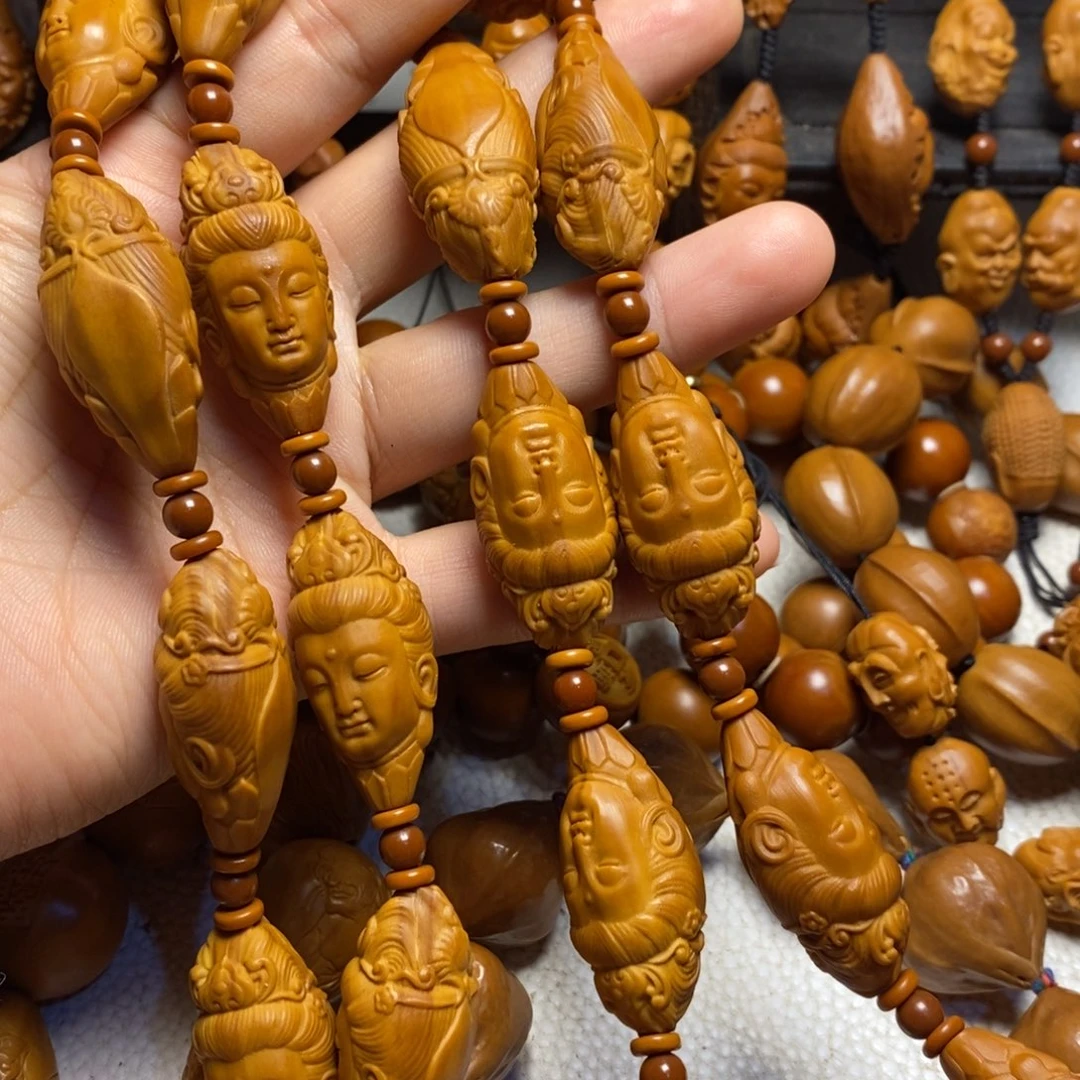 国***下吊坠橄榄核观音脖挂