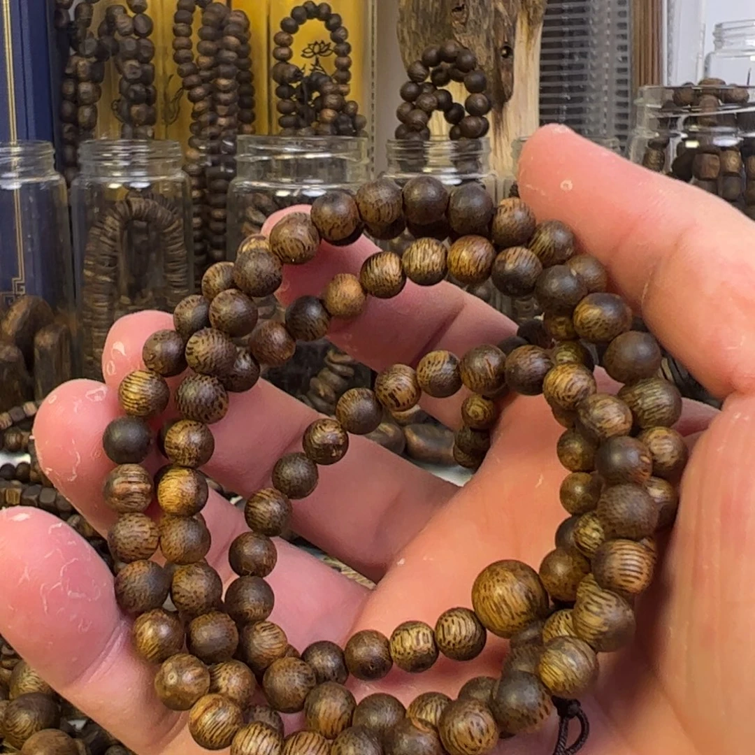 沉香手串乌身圆叶子手串12+
