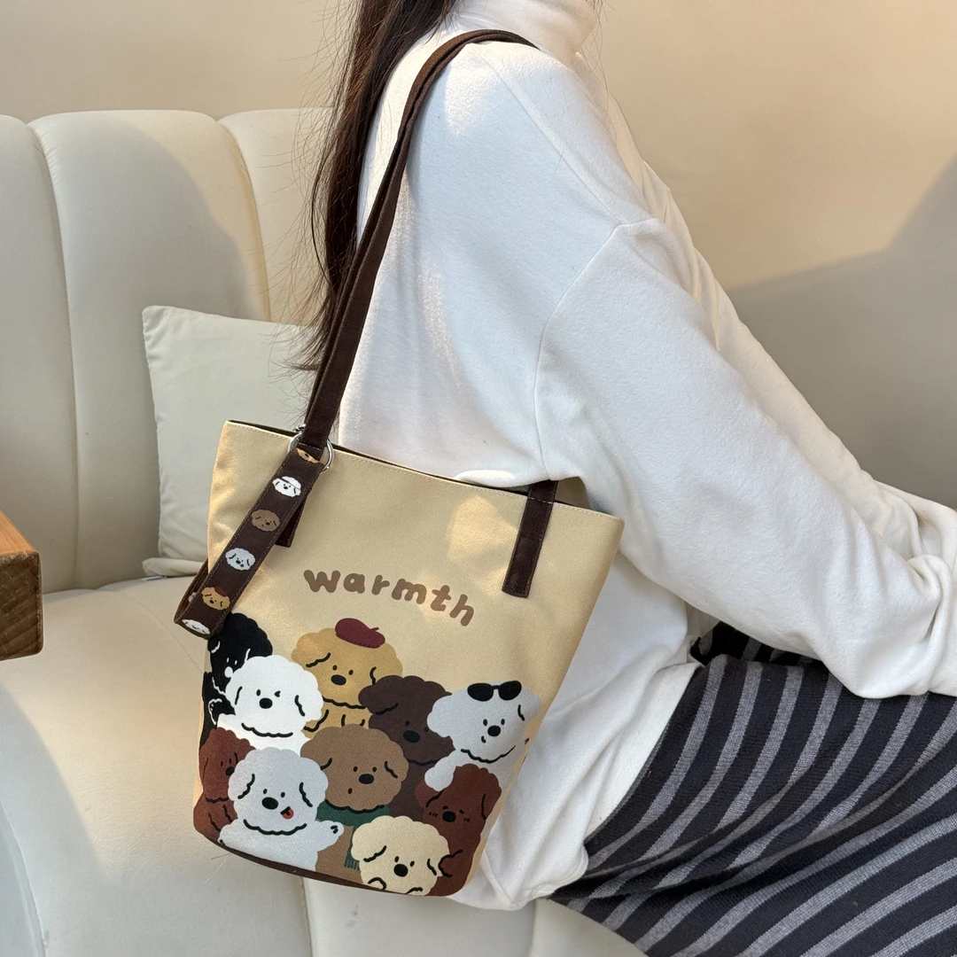 弘娜x一点心意 治愈秋冬温暖狗狗帆布包 可爱日常细肩带水桶包AI