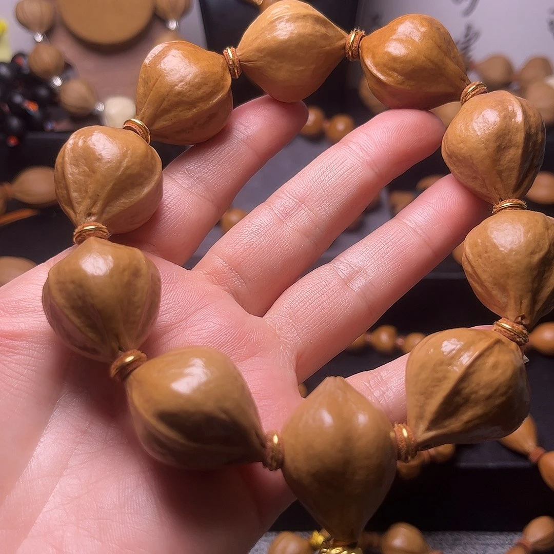 橄榄核手串清水王25.29微微瑕疵