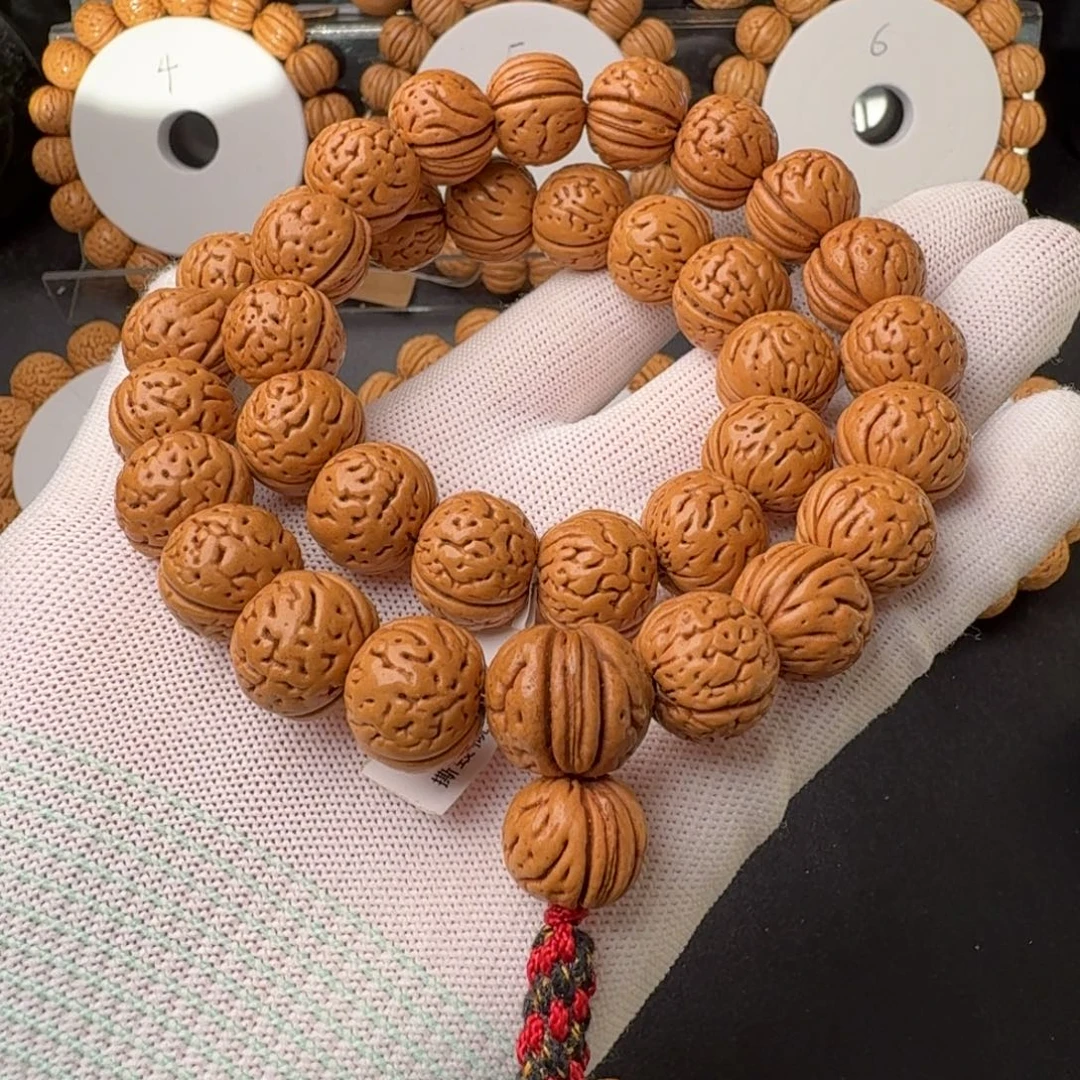 桃核手串盘锦野生大肌肉半挂