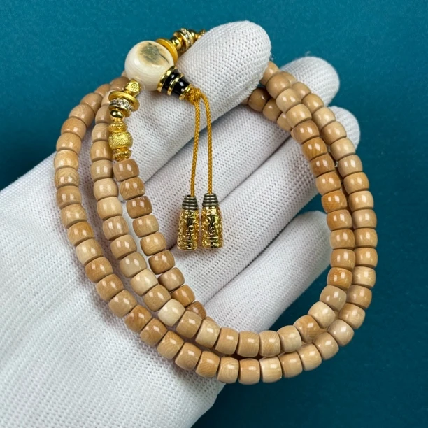 Q40-63天然猛犸牙 咖料直切108 6.4*5mm 支持复检