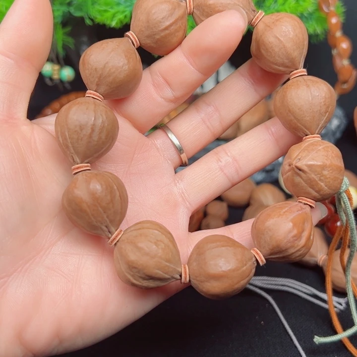 手串橄榄核江**庐2023