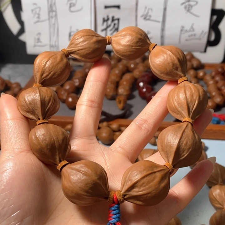 橄榄核手串0352精品4花老树王蒜头铁核9+1颗