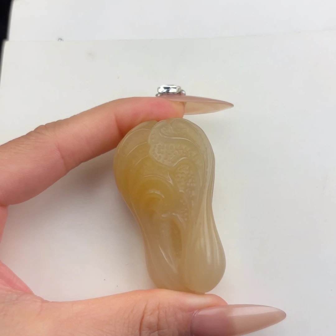 天***工石英质玉未镶嵌黄蜡石挂件