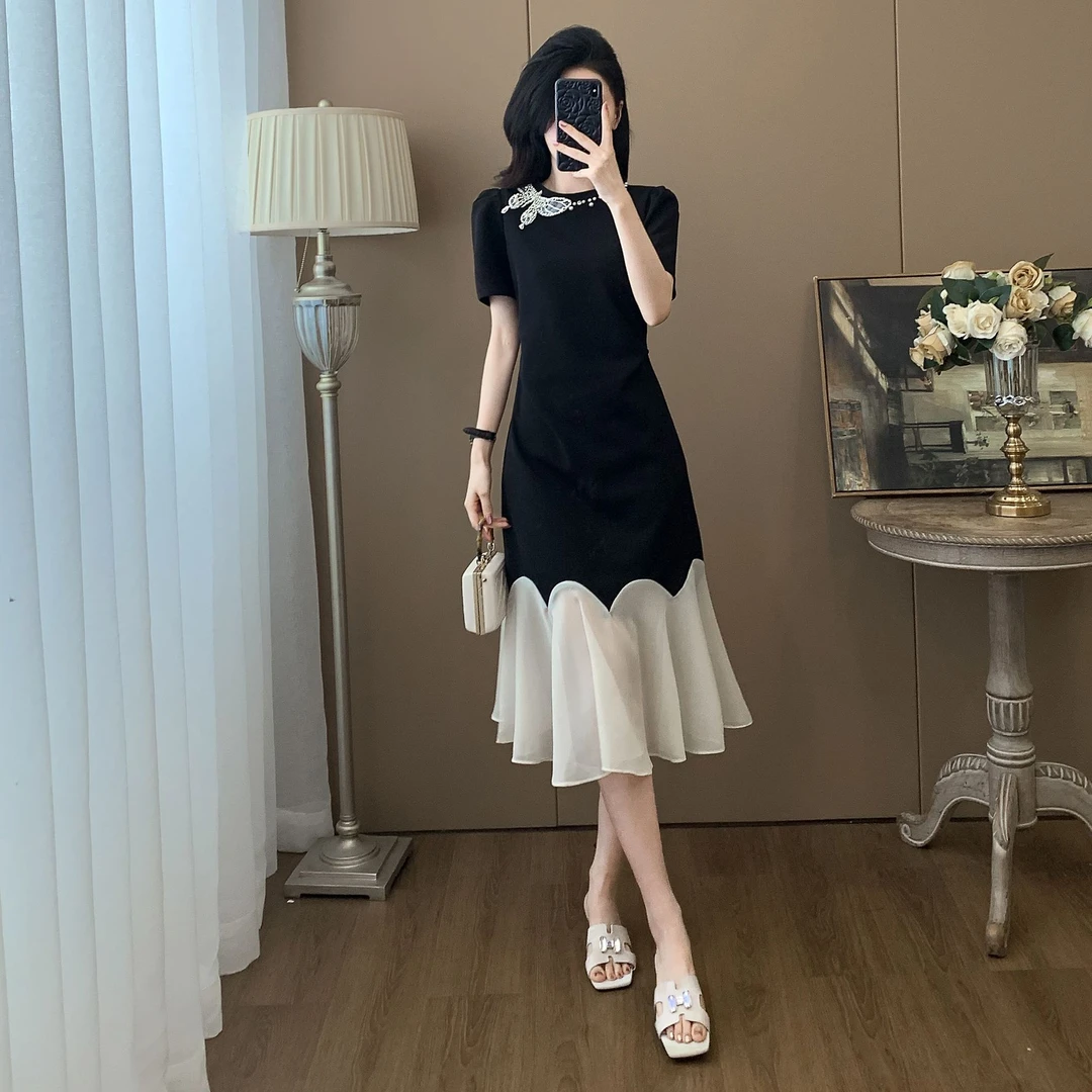 法式黑色短袖气质连衣裙夏季2025新款显瘦时尚高级感拼接黑色裙子