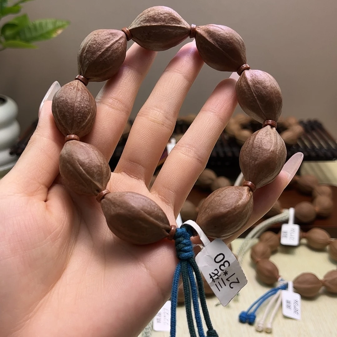 漂***泊吊坠橄榄核梅林铁核文玩手串