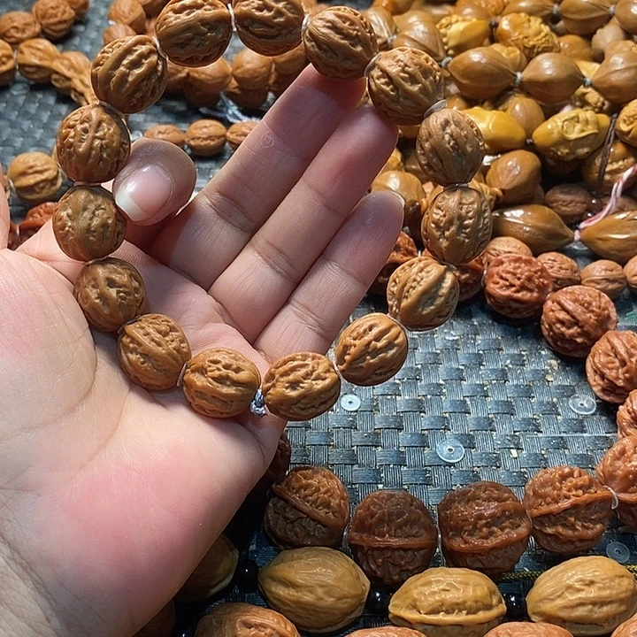 穆***森手串文玩核桃京八棱