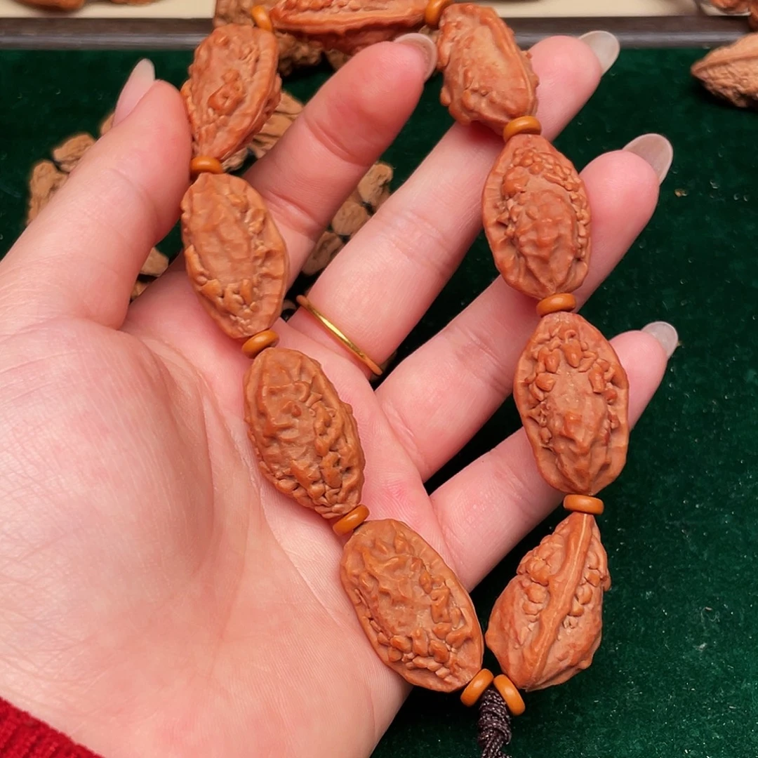 刘***员吊坠文玩核桃麒麟