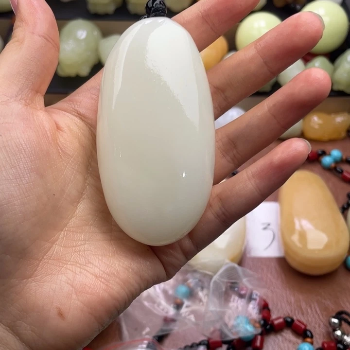 牵***风石材天然古青石手把件