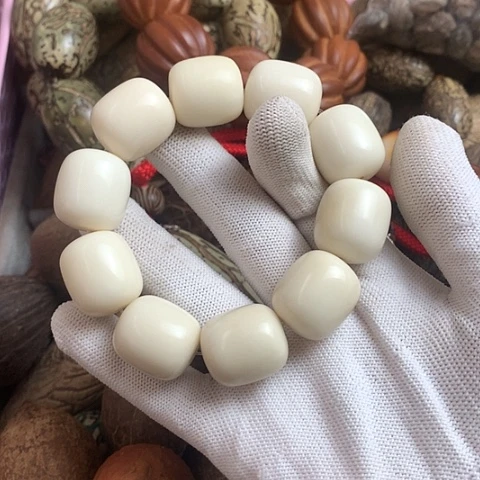 椰蒂吊坠深****室象牙果手串