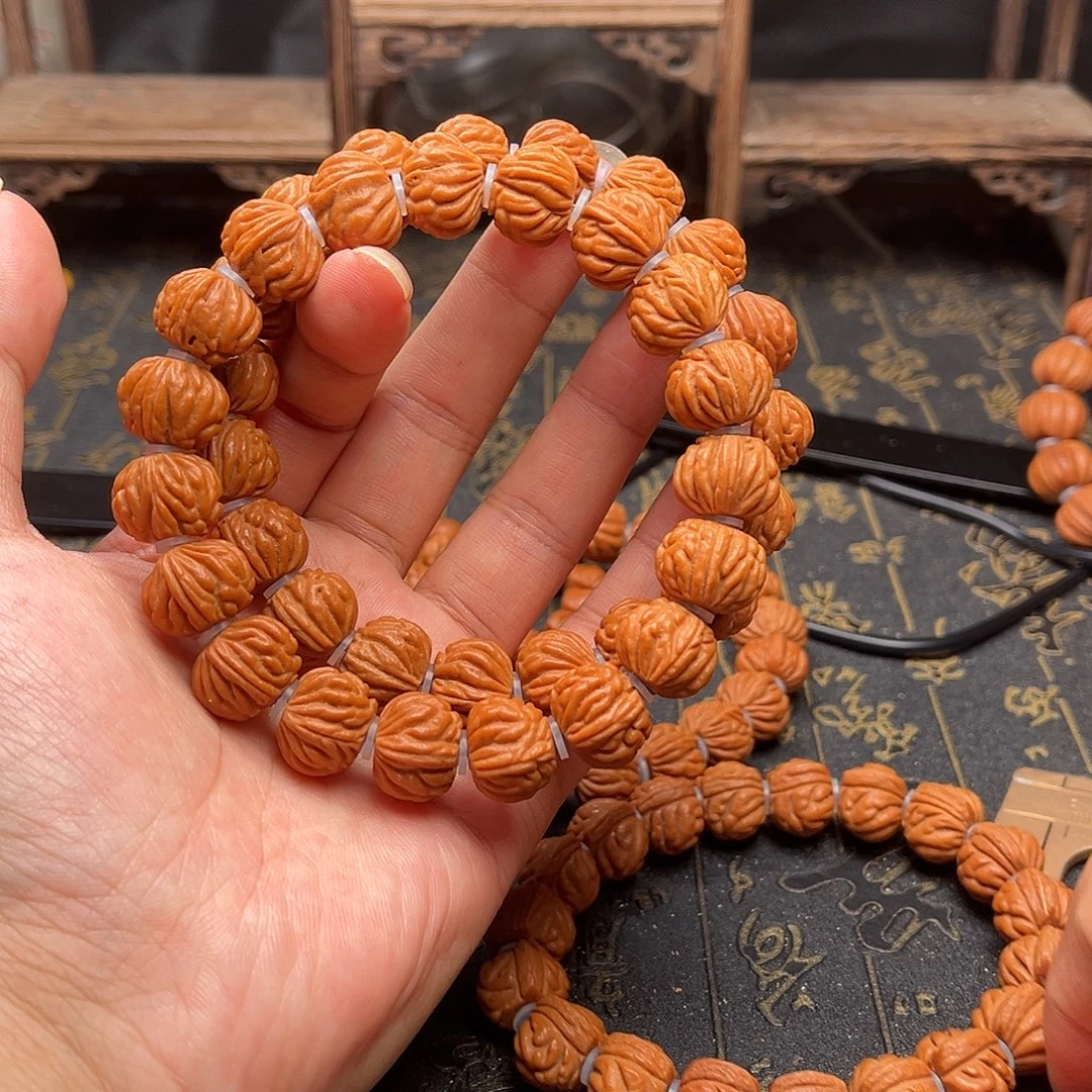 桃核吊坠小金豆手串